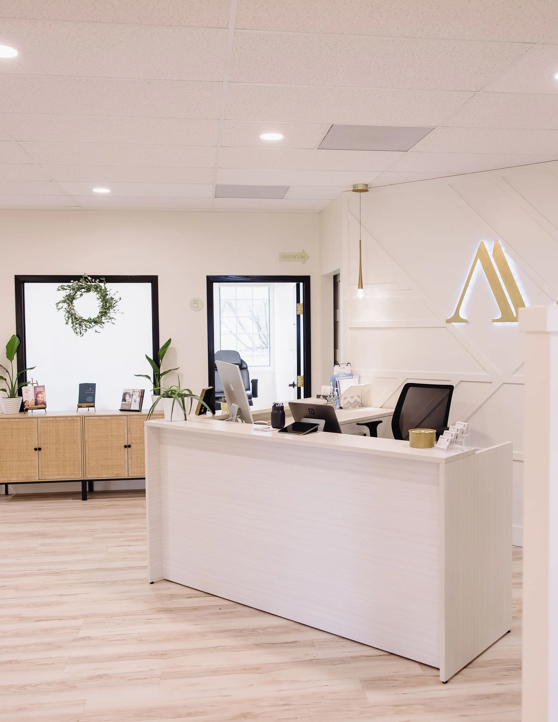 Bright reception area inside Another Look Hair Institute